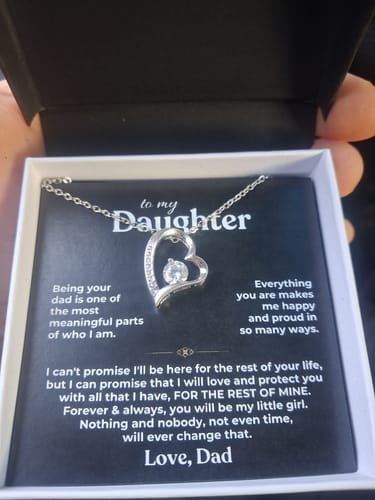 Customer's To My Daughter gift set featuring a heart-shaped necklace and a heartfelt message card inside a gift box.