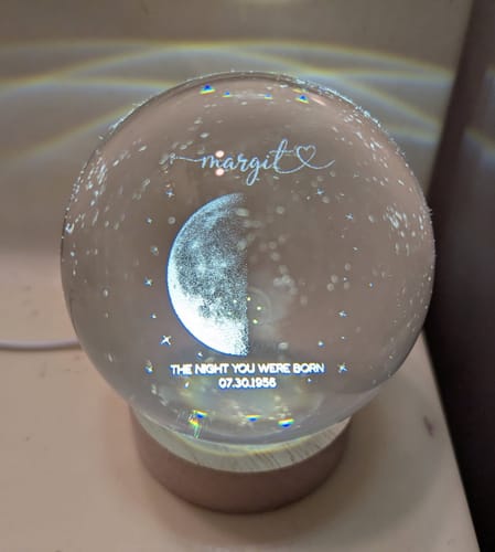 Customer's Personalized Crystal Ball LED Night Light, displaying the moon phase, name Margit, and birth date 07.30.1956.