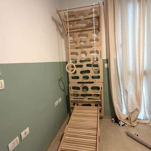 Customer photo review of Montessori Climbing Wall for Kids – Ages 2–10 with Slide, Pull-Up Bar & Rings | Wooden Indoor Playground
