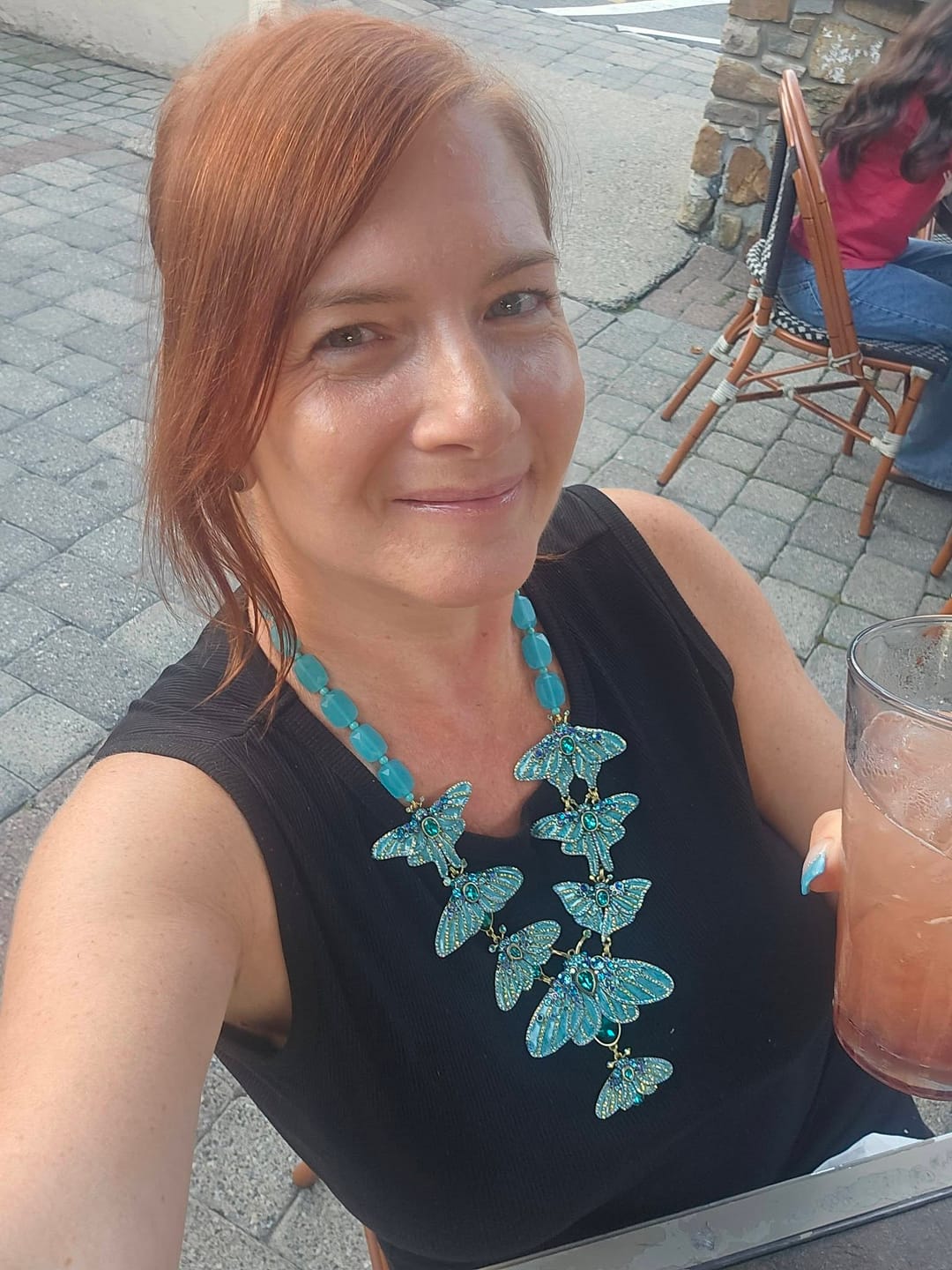 Customer photo review of HEIDI DAUS® "Butterfly Embrace" Crystal Butterfly Necklace