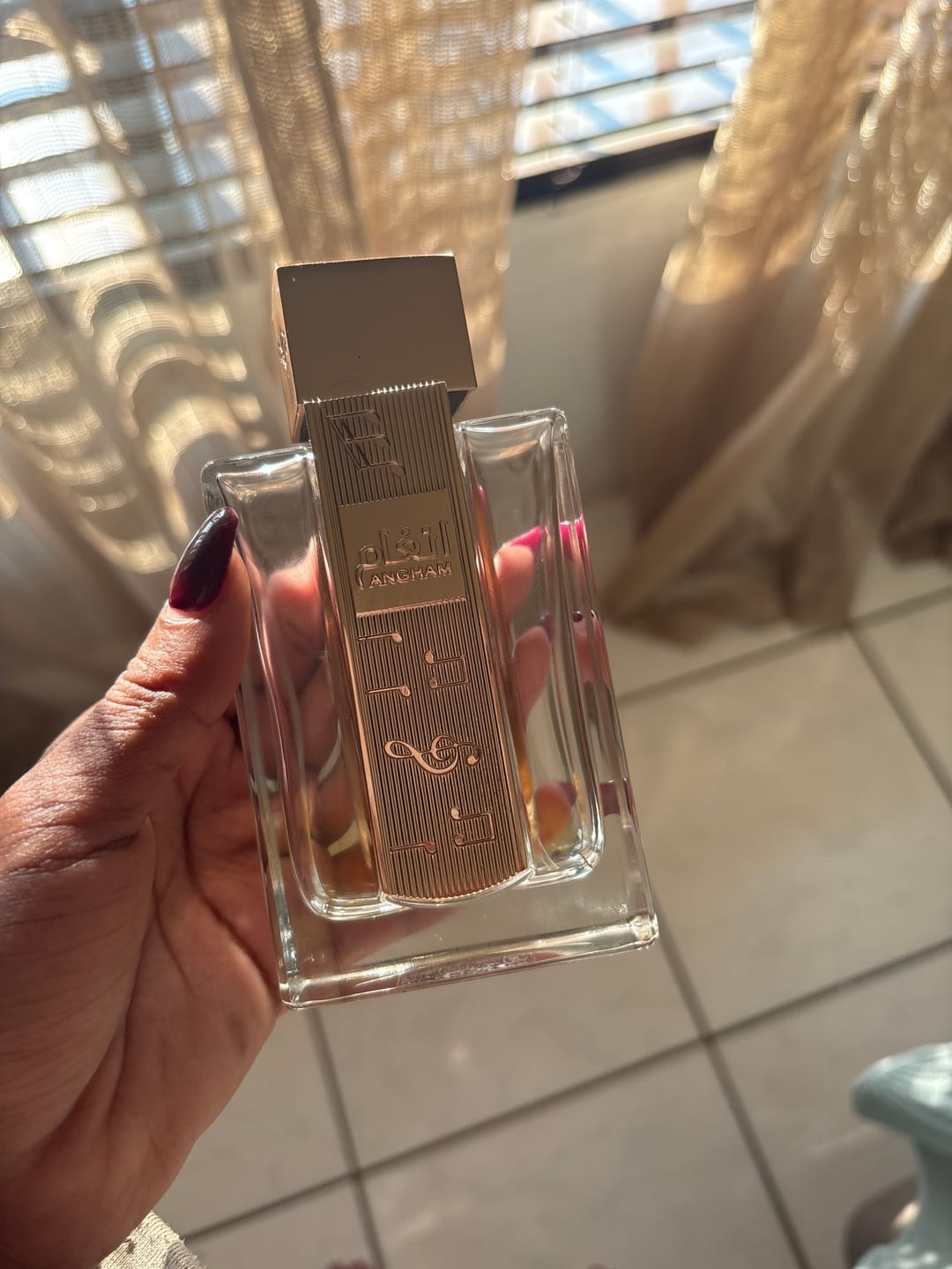 Customer photo review of Angham Eau De Parfum 100ml - Lattafa