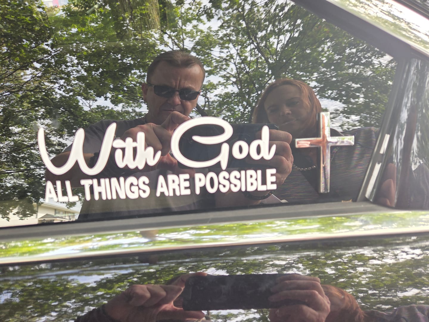 Customer photo review of Christianartworkshop Durable Metal Cross Car Decal: Remind of His Quiet Guidance on the Road