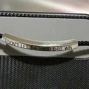 Customer photo review of FuAttract Don't Let The Hard Days Win Stainless Steel Engraved Tube Braided Courage Bracelet