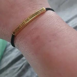 Customer photo review of FuAttract Don't Let The Hard Days Win Stainless Steel Engraved Tube Braided Courage Bracelet