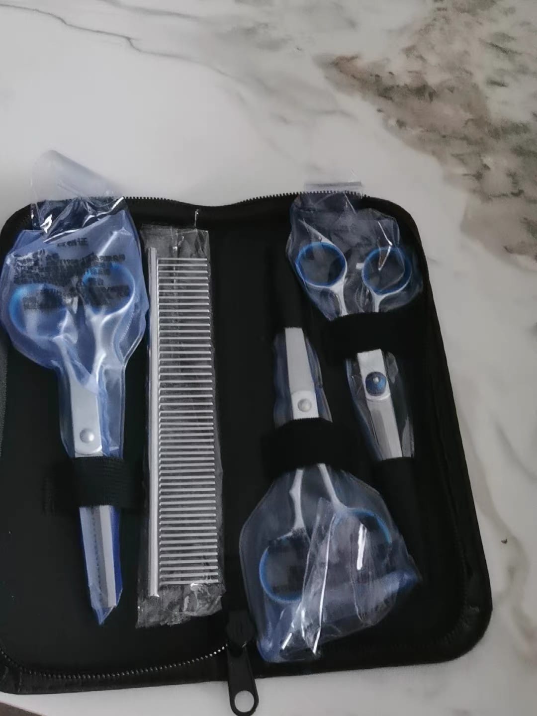 Customer photo review of Stainless Steel Pet Grooming Scissors & Comb