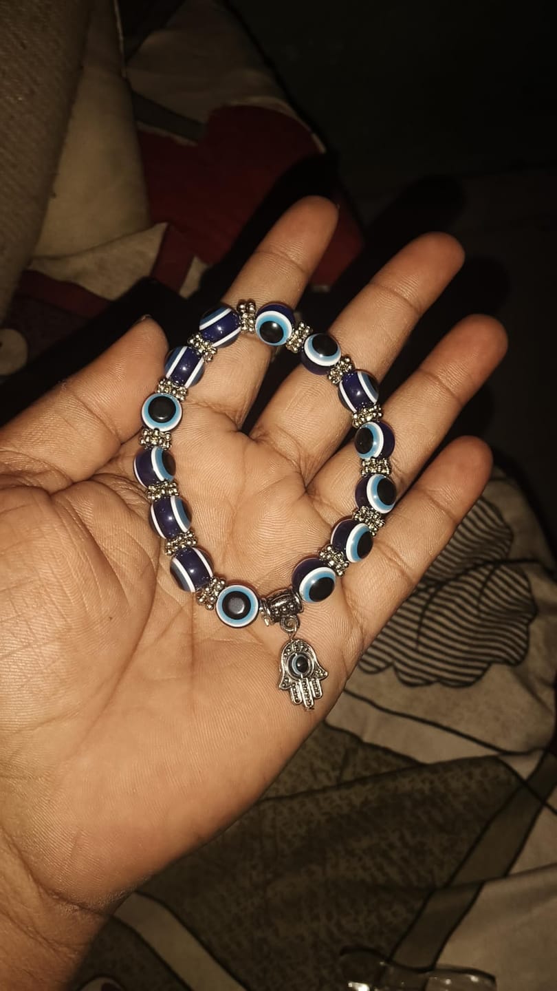 Customer photo review of FuAttract Protection Luck & Balance Hamsa Hand Evil Eye Charm Spiritual Bracelet